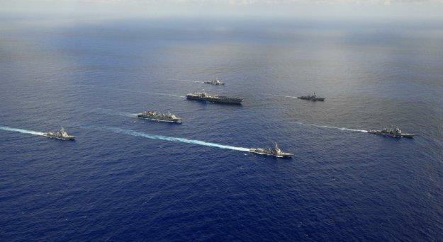 Ships from the John C. Stennis Carrier Strike Group are underway in the western Pacific Ocean. Petty Officer 3rd Class Walter W